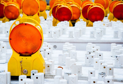 Close-up of illuminated lighting equipment at construction site