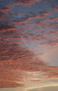 Low angle view of dramatic sky during sunset