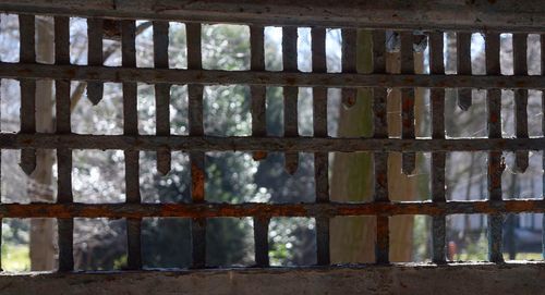 Close-up of rusty metal against sky