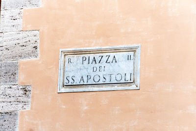Close-up of text on wall