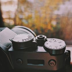 Close-up of camera on table