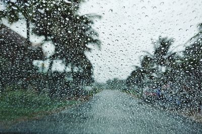 Full frame shot of raindrops on glass window