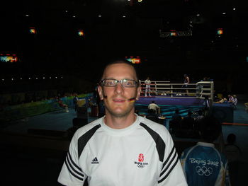 Portrait of smiling man at night