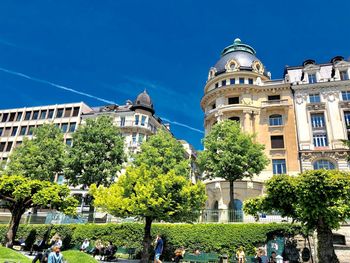 View of buildings against blue sky