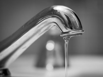 Close-up of water falling from faucet