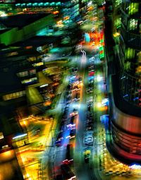 Aerial view of illuminated city at night