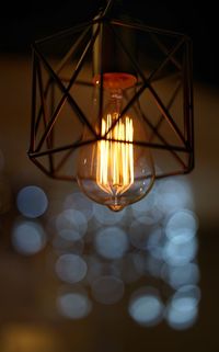 Low angle view of illuminated light bulb