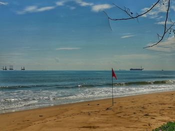 Scenic view of beach against sky