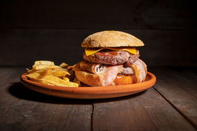 Close-up of burger on cutting board