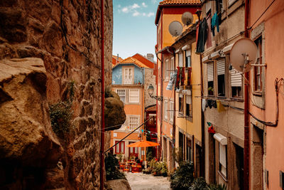 Narrow street amidst buildings in town