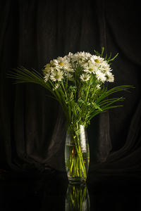 Close-up of flowers on table