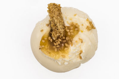 Close-up of cake against white background