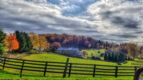 Scenic view of field against sky during autumn