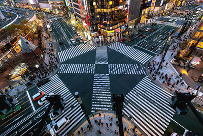 High angle view of illuminated buildings in city