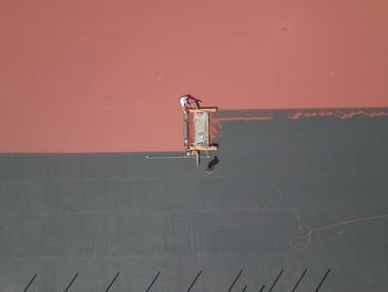 Aerial view of men with machinery on road