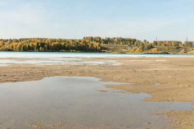 Scenic view of beach against sky