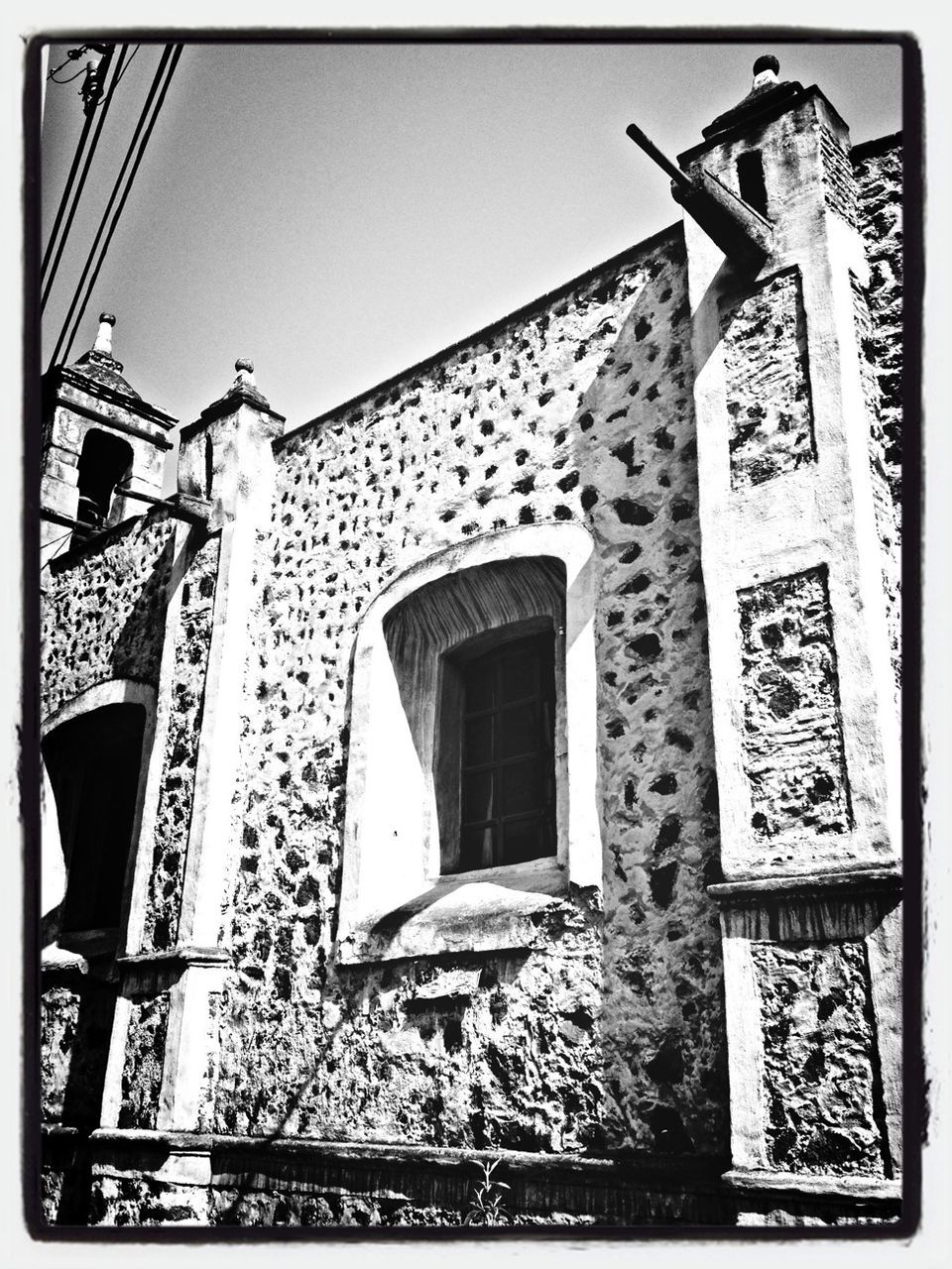 architecture, building exterior, built structure, transfer print, low angle view, auto post production filter, window, religion, church, place of worship, clear sky, house, old, day, outdoors, spirituality, building, entrance