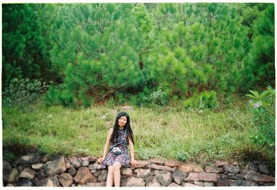 Portrait of a young woman in forest