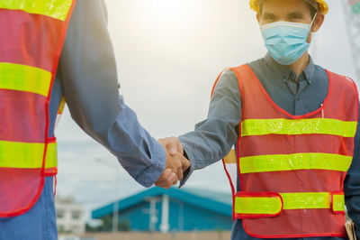 Low angle view of men working