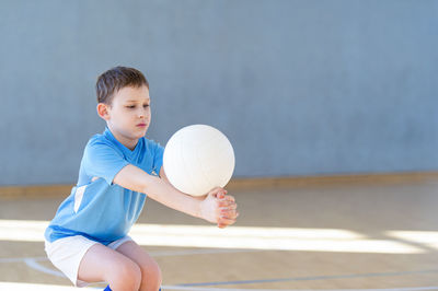 Boy playing volleyball