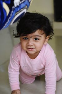 Cute baby girl at home