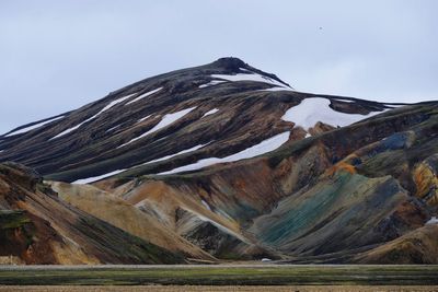 Low angle view of majestic mountain against sky