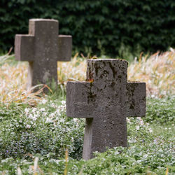 Stone cross on cemetery