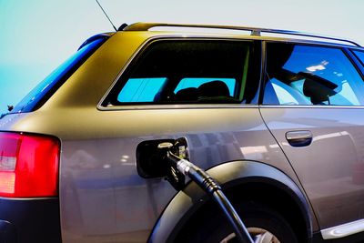 Close-up of side-view mirror of car