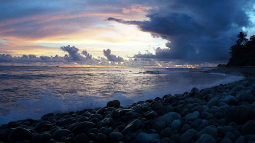 Scenic view of sea against sky during sunset