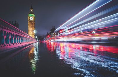 Light trails on illuminated city at night