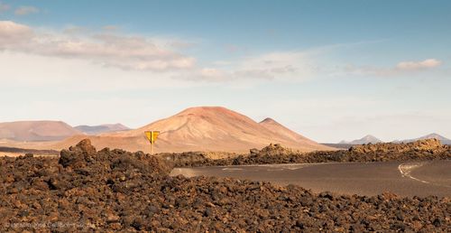 Scenic view of desert against sky