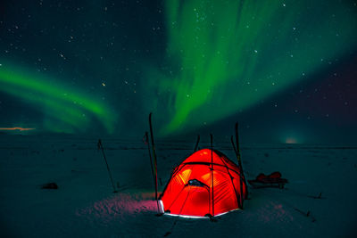 Tent against sky at night