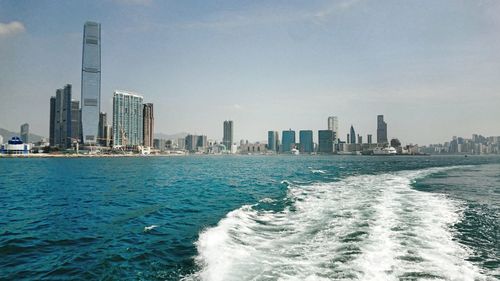 Sea with city in background