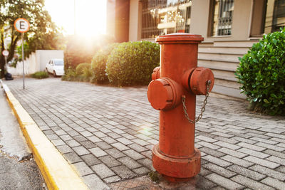 Fire hydrant on sidewalk in city