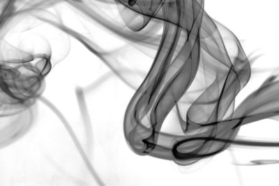 Close-up of smoke against white background