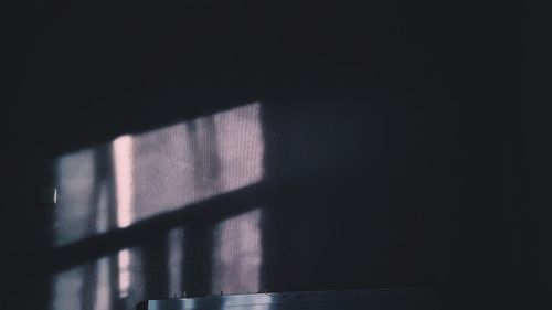 Shadow of window on building