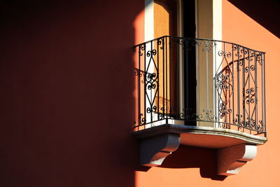 Low angle view of building seen through window