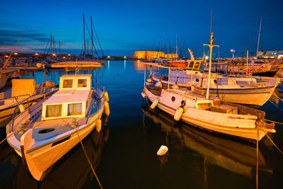 Venetian fort in heraklion and moored fishing boats, crete island, greece