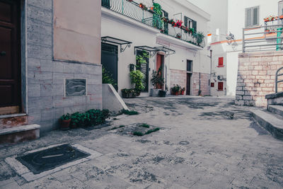 Alley amidst buildings in city