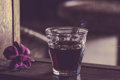 Close-up of beer glass on table