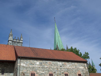 Low angle view of traditional building against sky