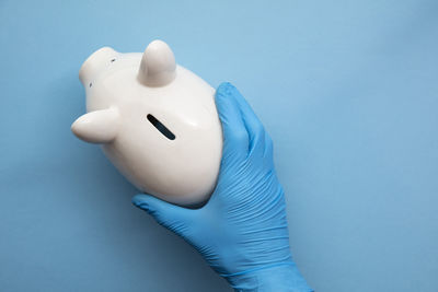 High angle view of stuffed toy against blue background