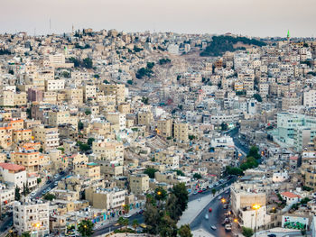 High angle view of buildings in city against sky