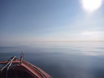 Cropped image of boat on sea against sky