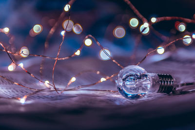 Close-up of illuminated light bulb