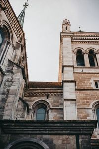 Low angle view of building against sky in city