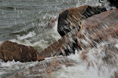 Scenic view of rocks in sea