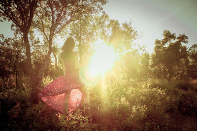 Woman sitting on a field