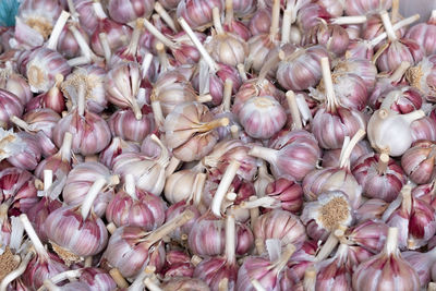 Full frame shot of onions for sale in market