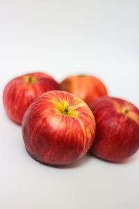 Close-up of apple on white background